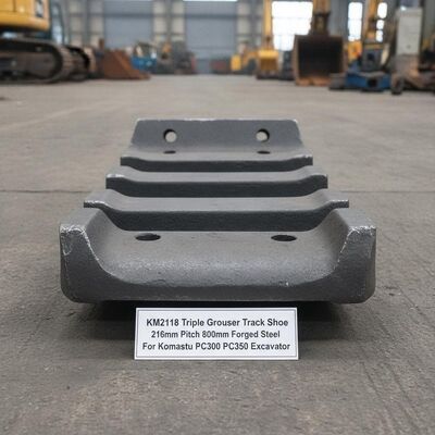 質 KM2118 トリプルグルーザートラックシュー 216mmピッチと800mm幅のコマツーPC300PC350掘削機の下車 工場